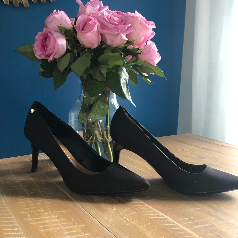 Brand new Calvin Klein black pumps.